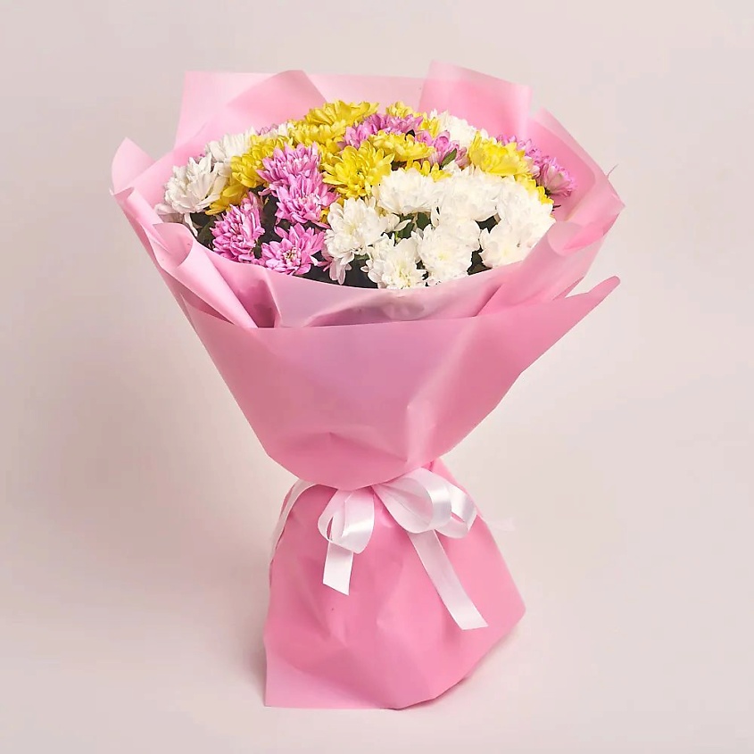 Изображение товара AZALIANOW ЦВЕТЫ. ПОДАРКИ. ДЕКОР Букет из 15 разноцветных кустовых хризантем в упаковке, Букеты и композиции из живых цветов могут на несколько тонов отличаться от изображений. Часть цвета искажается в зависимости от настроек экрана.