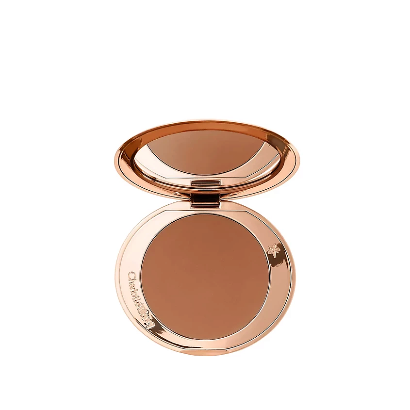Изображение товара Charlotte Tilbury Airbrush Bronzer Tan - роскошный матовый бронзер для лица и тела