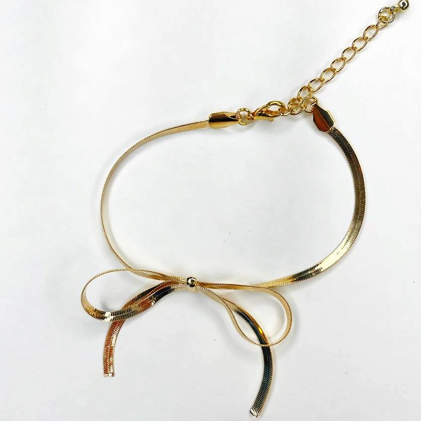 Изображение товара Изящный женский браслет Бантик из бижутерного сплава GILMEEVA