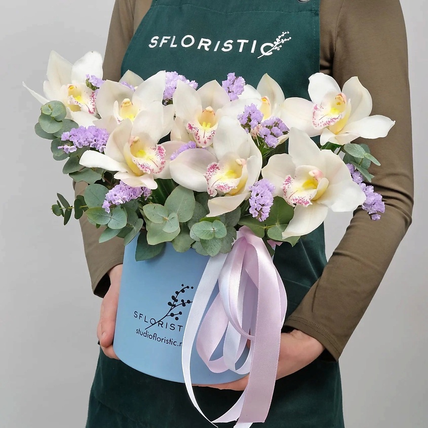 Изображение товара Композиция из орхидей "Волшебный каскад" в шляпной коробке