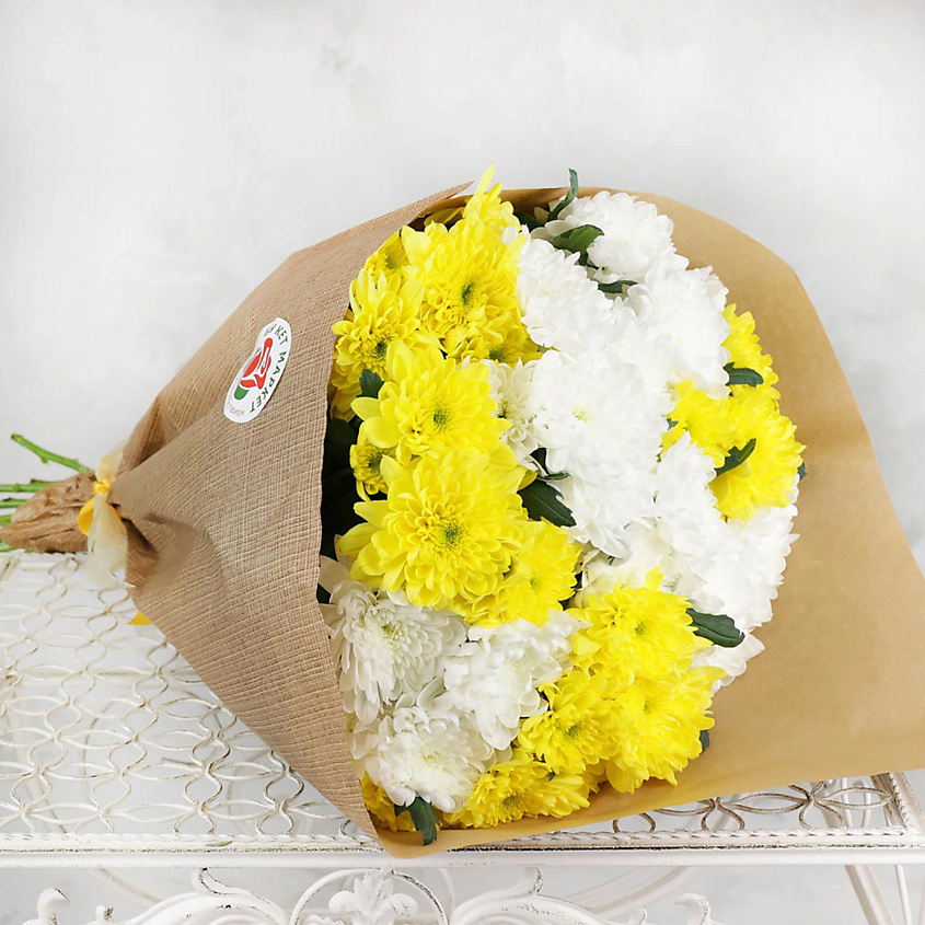 Изображение товара Букет из 11 разноцветных хризантем в крафте