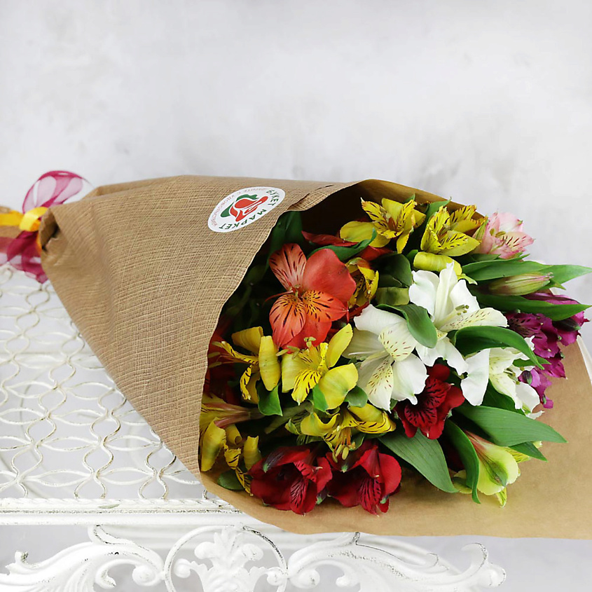 Изображение товара Букет из 7 разноцветных альстромерий в крафте - яркий подарок для любого повода